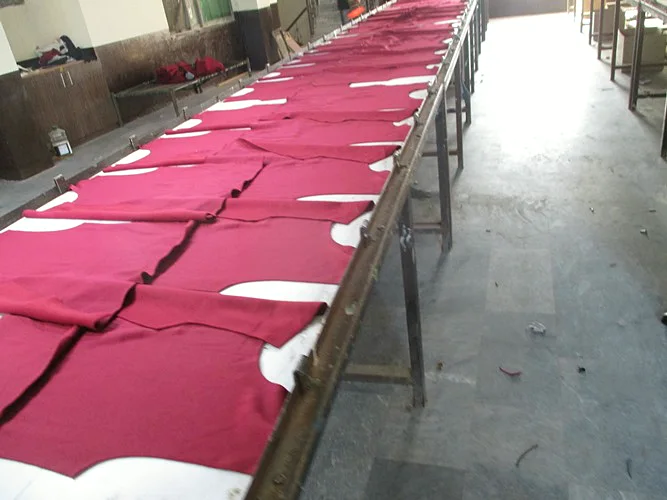 Cutting stage of SPORTIFY in-house manufacturing in Sialkot